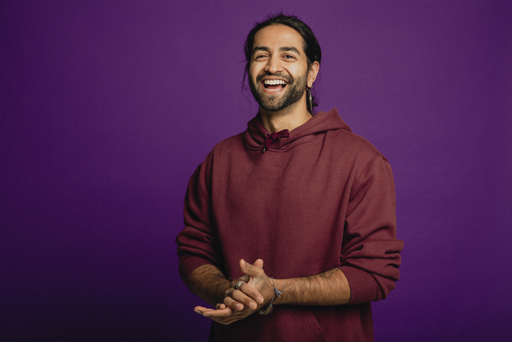 Young man smiling happily 